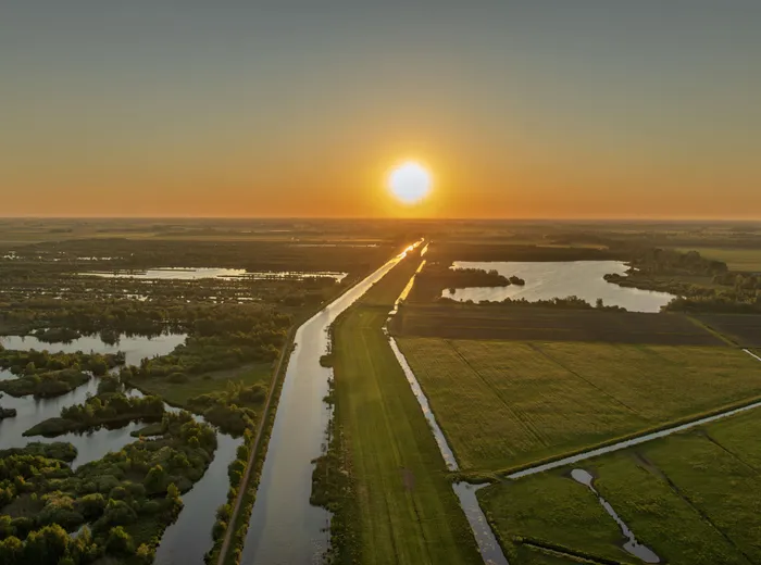 De Deelen bij zonsondergang, het wandelgebied naast NEST